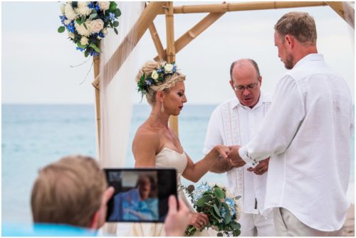 facetiming in grooms father during gorgeous Melbourne Beach wedding