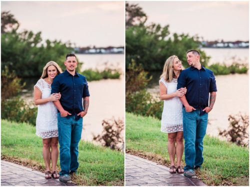 Couple together by shores of Indian River lagoon during Vero Beach engagemen