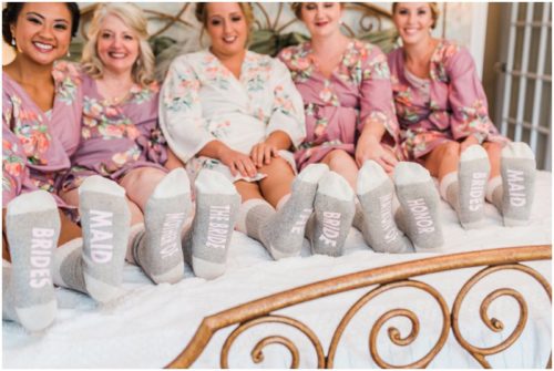 Bridesmaids with socks at Up the Creek Farms Wedding