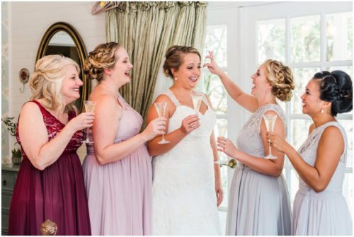 Bridesmaids having a toast at Up the Creek Farms Wedding