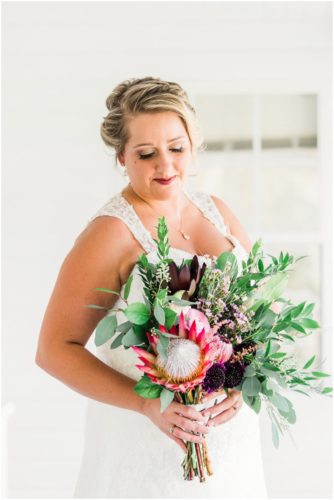 Bride with Up the Creek farms florals