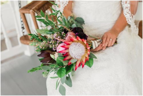 Gorgeous red, pink and green bouquet at Up the Creek Farms Wedding