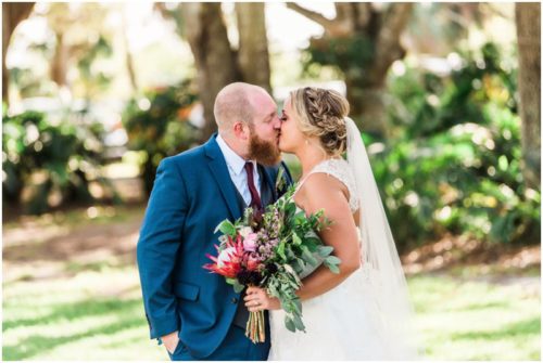 Bride and groom kissing at Up the Creek Farms Wedding
