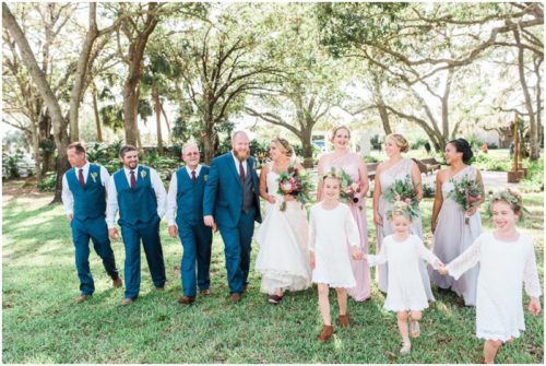 Bridal party walking on grounds at Up the Creek Farms Wedding