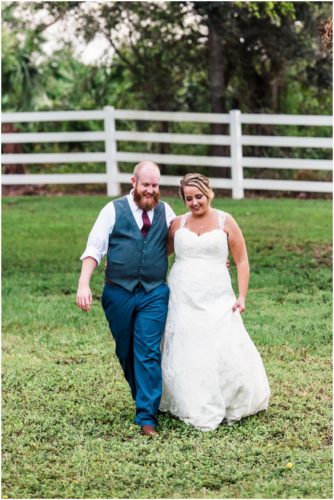 Bride and groom walking on the grounds at Up the Creek Farms Wedding