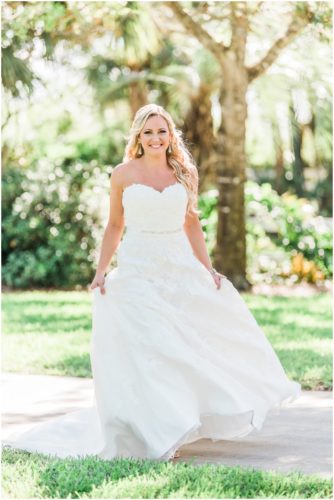 Bride walking in wedding gown during a beautiful Up the Creek Farms Wedding