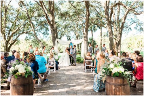 Ceremony under the Oaks during beautiful Up the Creek Farms Wedding