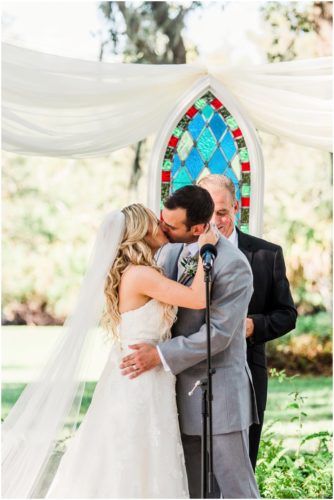 First kiss during beautiful Up the Creek Farms Wedding
