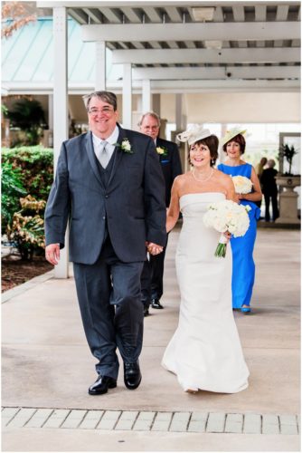 Bride and groom outside by boats Eau Gallie Yacht Club Wedding
