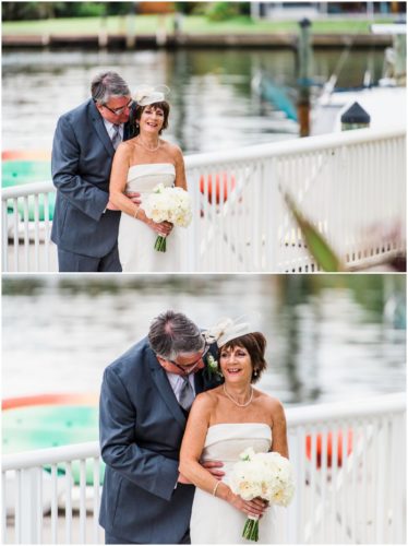 Bride and groom outside by boats Eau Gallie Yacht Club Wedding