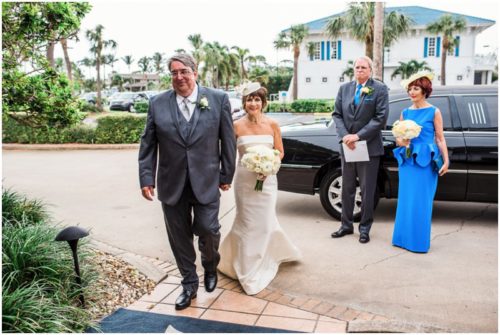 Bride and groom outside by boats Eau Gallie Yacht Club Wedding