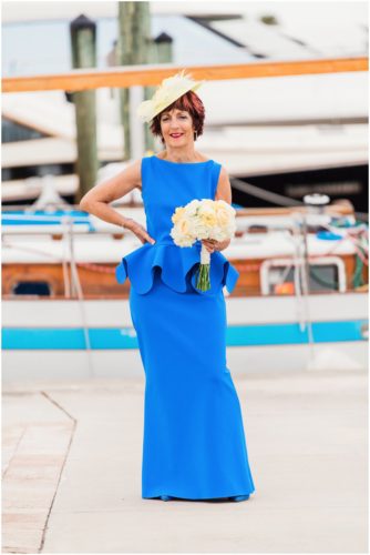 Bridesmaid outside by boats Eau Gallie Yacht Club Wedding