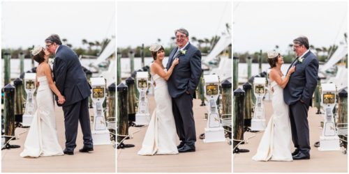 Bride and groom outside by boats Eau Gallie Yacht Club Wedding