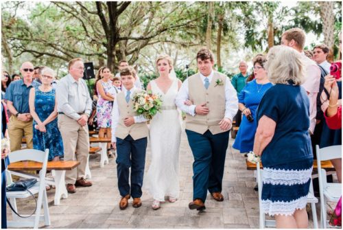 Walking down asile during a Up the Creek Farms Wedding