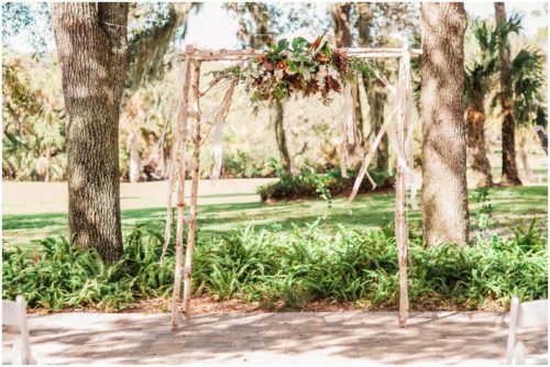 Ceremony arch setup during a Up the Creek Farms Wedding