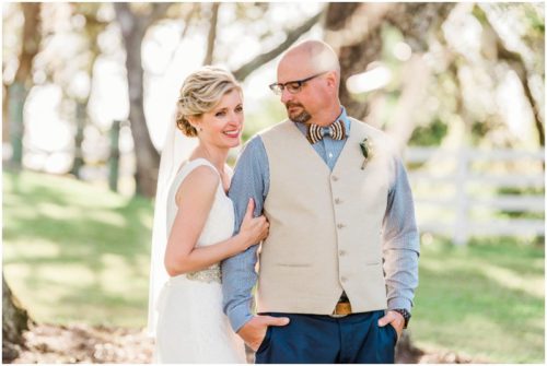 Couple under the oaks during a Up the Creek Farms Wedding