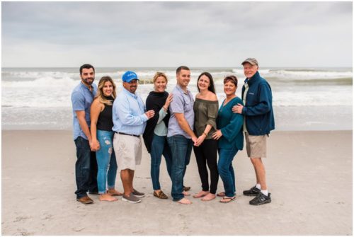 Family celebrating on beach at Cocoa Beach Proposal