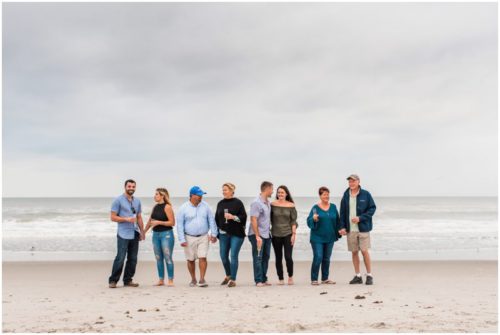 Family celebrating on beach at Cocoa Beach Proposal