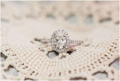 Engagement ring on vintage lace on beach at Cocoa Beach Proposal