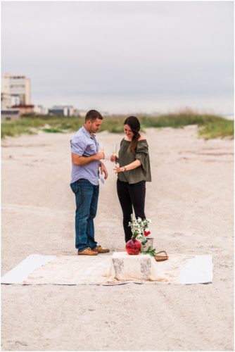 Bride looking at ring during Cocoa Beach Proposal