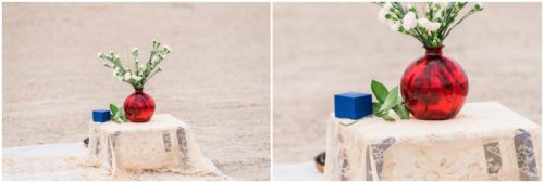 flowers and vintage lace blanket on beach during Cocoa Beach Proposal