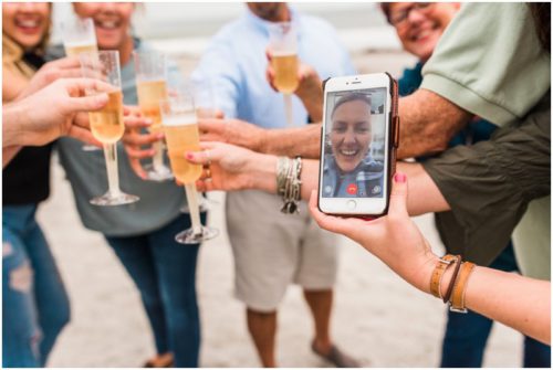 Family laughing during cocoa beach proposal