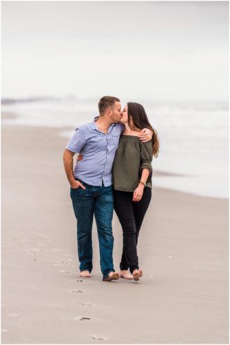 Couple together on beach during Cocoa Beach Proposal