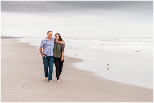 Couple together on beach during Cocoa Beach Proposal