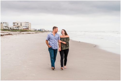 Couple together on beach during Cocoa Beach Proposal