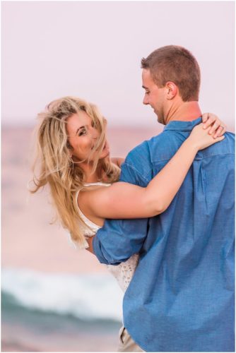Windy hair during a beach engagement session in Central Florida