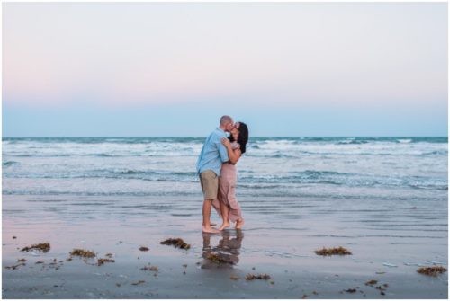 Couple kissing Beach Engagement at Jetty Park