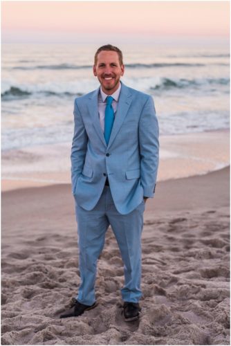 Groom by ocean Satellite Beach Wedding