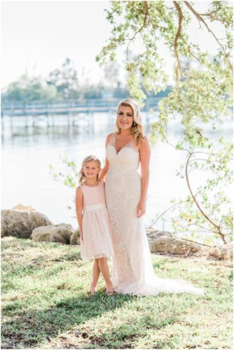Bridesmaids walking by river Satellite Beach Wedding