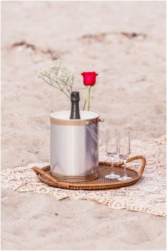 Champagne bucket on beach during Cocoa Beach Surprise Proposal