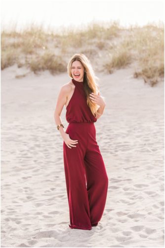 Bride in red jumpsuit during Cocoa Beach Surprise Proposal
