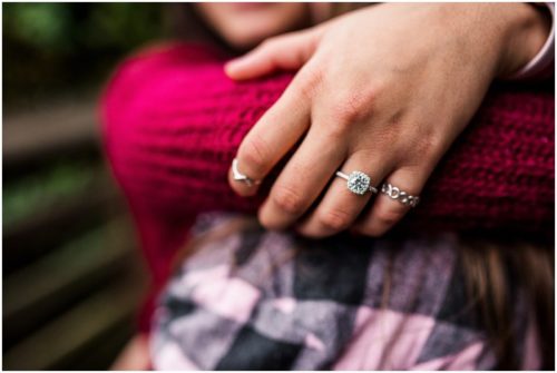 hugging showing engagement ring during Florida proposal