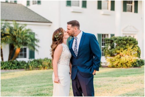Bride and groom kissing during Bellewood Plantation wedding, Vero Beach, Florida
