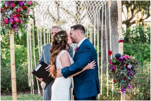 First kiss during Bellewood Plantation wedding, Vero Beach, Florida