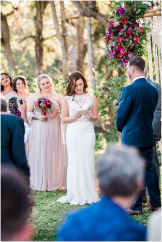 Reading vows during Bellewood Plantation wedding, Vero Beach, Florida