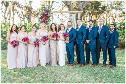 bride party in front of arch during Bellewood Plantation wedding, Vero Beach, Florida