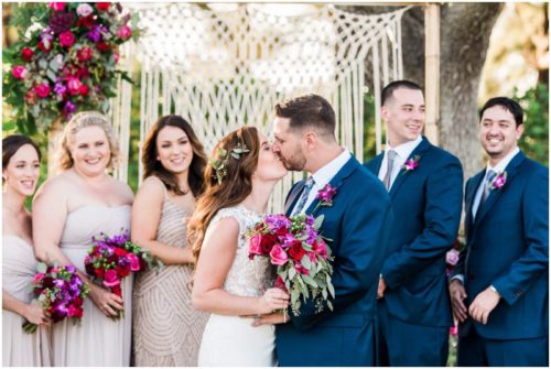 bride and groom kissing during Bellewood Plantation wedding, Vero Beach, Florida