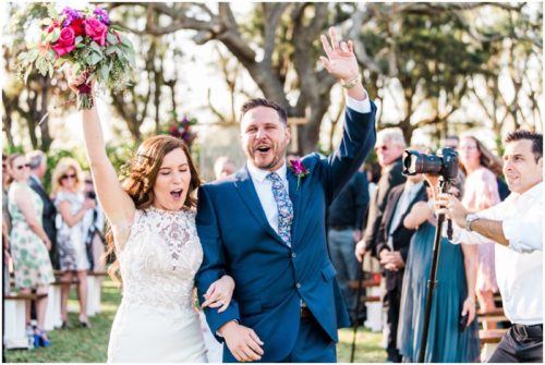 Couple hurray during Bellewood Plantation wedding, Vero Beach, Florida