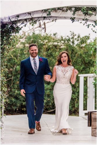Couple entering reception during Bellewood Plantation wedding, Vero Beach, Florida