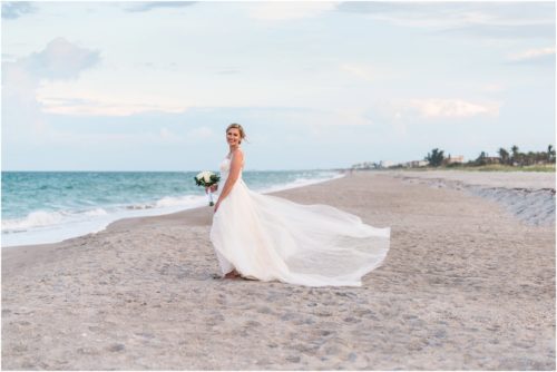 Bride with dress flowing in the wind Cocoa Beach Wedding