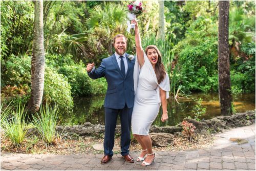 bride and groom laughing at Florida Tech Botanical Gardens Wedding
