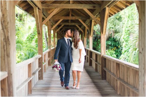 Walking under bridge at Florida Tech Botanical Garden Wedding