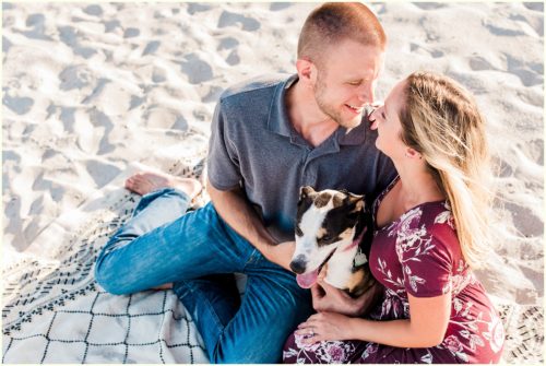 couple on beach with dog Melbourne Florida engagement photographer