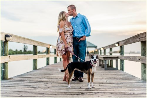 Couple with dog on dock Melbourne Florida Engagement Photographer