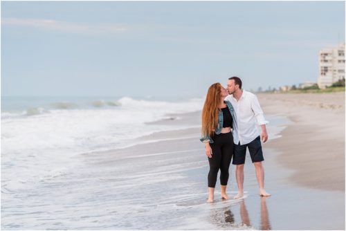 couple kissing by water Central Florida Sunrise Proposal