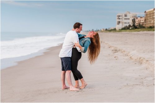 Laughing on beach Central Florida Sunrise Proposal
